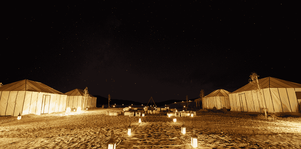 Things to do in Merzouga at night include stargazing under a crystal-clear sky. A must during your one night in desert Merzouga, this unforgettable experience is a peaceful Merzouga activity and part of many Merzouga camp & desert activities.