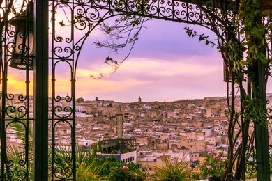 Witness breathtaking sunsets from a rooftop in Fes, offering panoramic views of the city. A perfect way to experience the charm of Fes and a top activity for those exploring things to do in Fes.