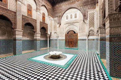 Step inside the Al Attarine Madrasa, a stunning example of Moroccan architecture and history. A must-see for those exploring things to do in Fes, offering a glimpse into Fes' cultural past.
