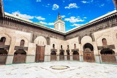 Discover the Bou Inania Madrasa in Fes, a stunning religious school with intricate architecture. One of the most enriching things to do in Fes for those interested in Moroccan heritage.